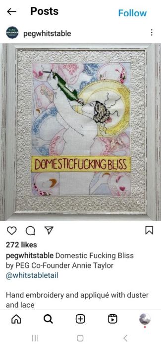 A screenshot of an image post by the Instagram account @pegwhitstable. It is an embroidered image of a naked woman standing sideways and drinking directly from a wine bottle. In the background is a motley collection of broken ceramic utensils such as plates, cups, forks, and spoons. A yellow banner is embroidered across the bottom of the woman. On top of the banner is a red text that reads: Domestic Fucking Bliss. The embroidery is surrounded by lace and a white wooden frame.
