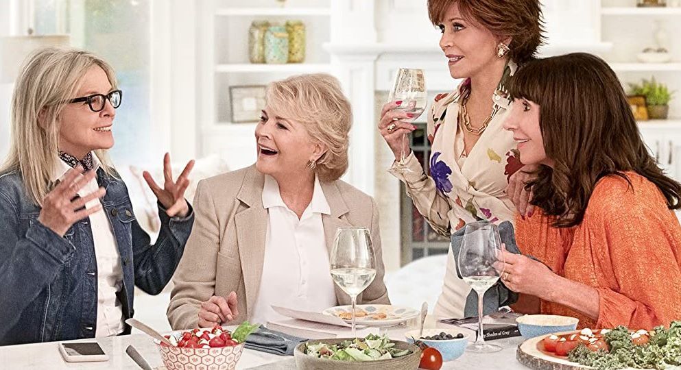 A poster for the film featuring the four actresses – Diane Keaton, Jane Fonda, Candice Bergen, and Mary Steenburgen – laughing and talking at a dining table.