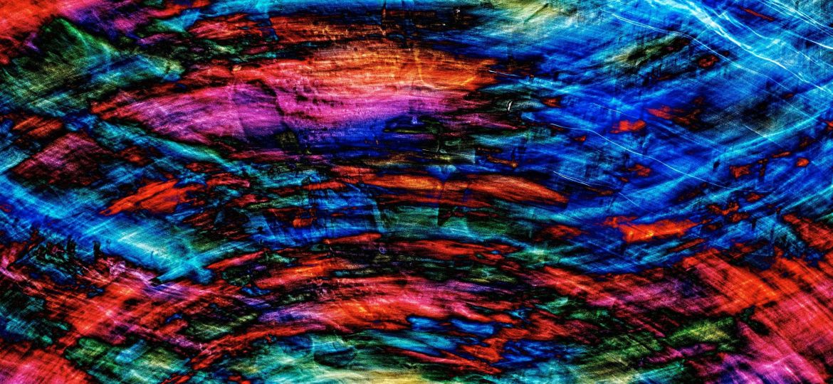 A multicolored image of a swirl in the middle of the image