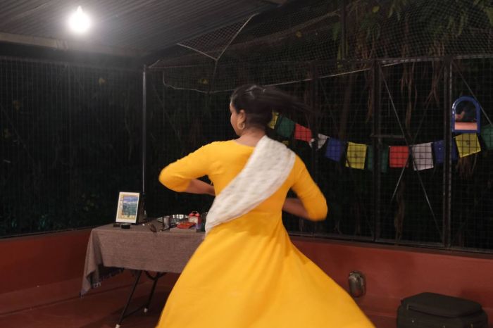 A woman making a turn during her dance performance
