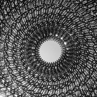 an image of a white circle with spiral black patterns around it