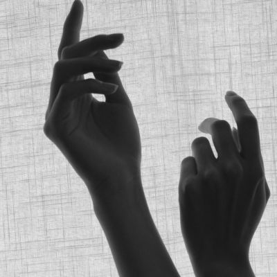 grayscale photo of a person's hand
