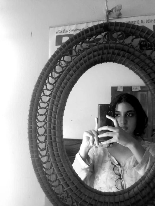 A mirror selfie of the author