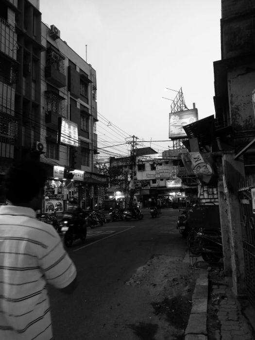 a street photo of a lane in a commercial area