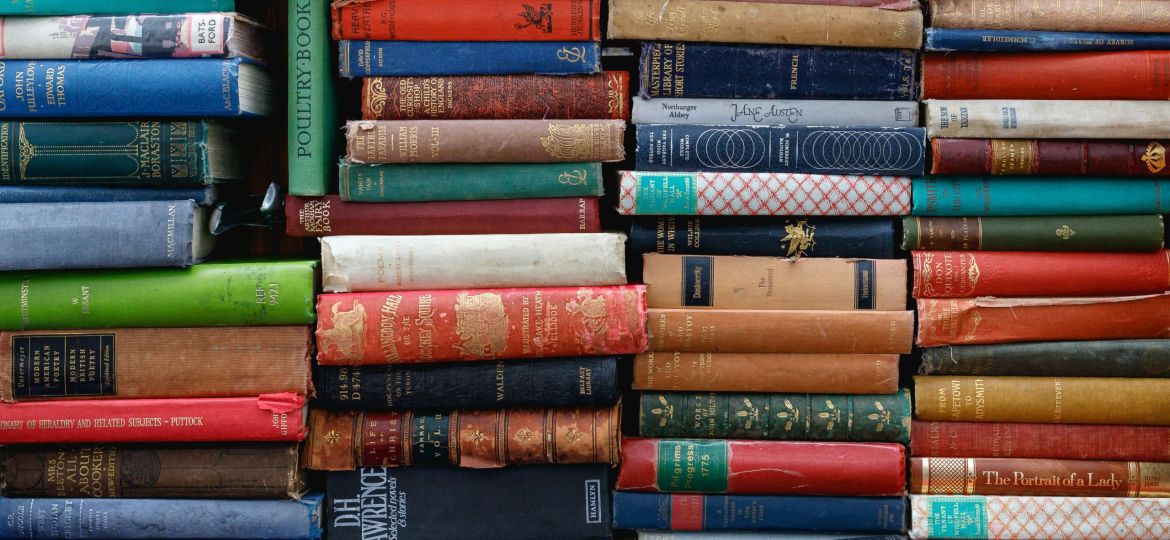 assorted books stacked together